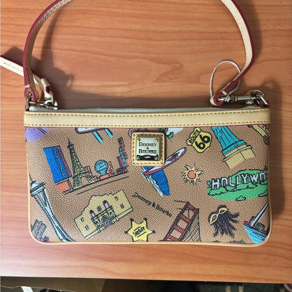 Dooney & Bourke Handbags - Dooney & Bourke Tan Wristlet with Colorful Landmark Print